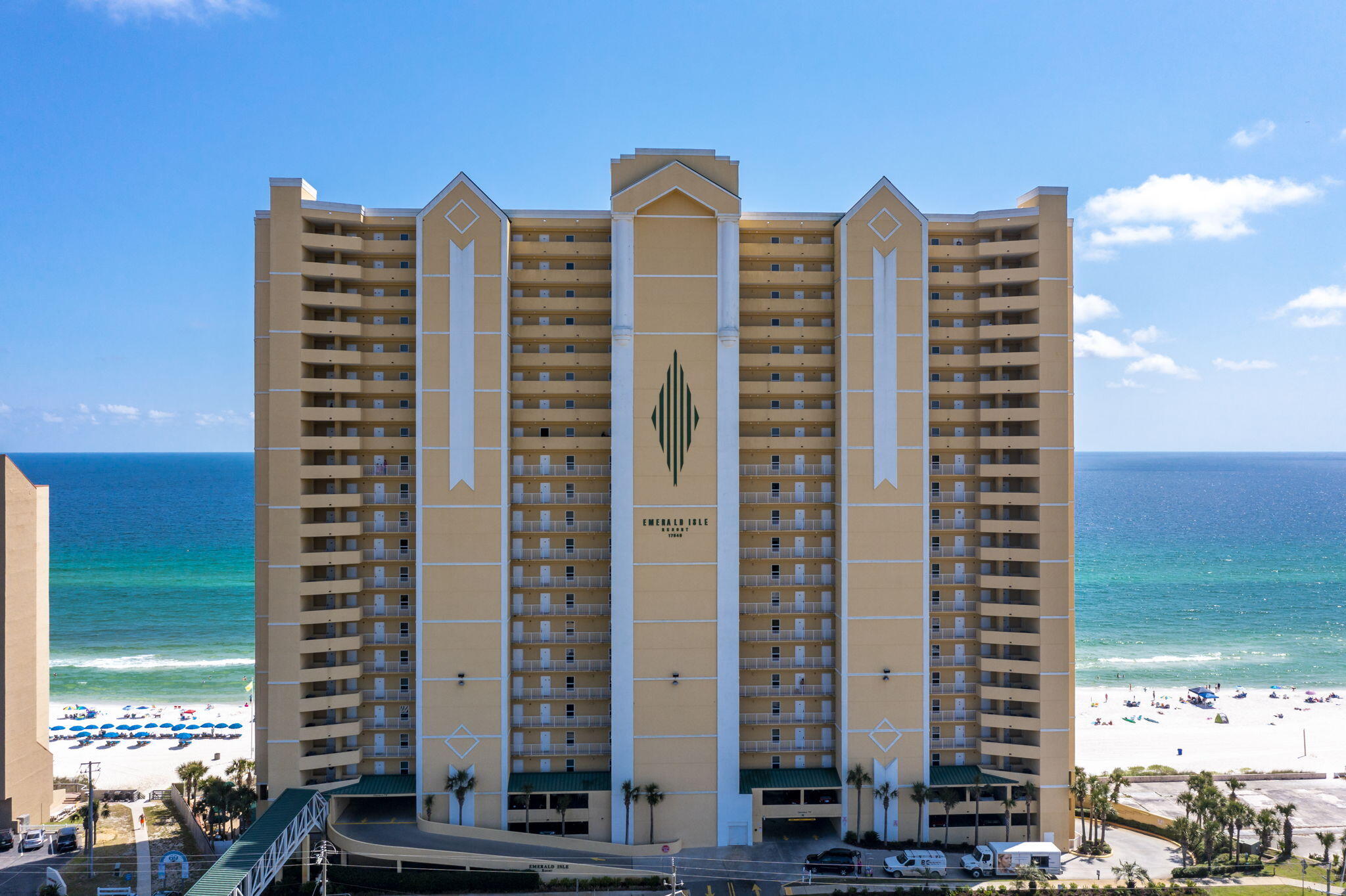 Welcome to your Gulf-front retreat at Emerald Isle! This beautifully maintained 12th-floor condo offers breathtaking, unobstructed views of the sugar-white sands and emerald waters of Panama City Beach. The spacious, open-concept floor plan features 2 bedrooms and 2 bathrooms, providing the perfect blend of comfort and style for both personal enjoyment and rental potential. Step inside to find a bright and airy living space, with sliding glass doors leading to an expansive private balcony--ideal for morning coffee, evening sunsets, or entertaining guests while enjoying the soothing sound of the waves. The well-appointed kitchen includes modern appliances, ample cabinetry, and a breakfast bar for casual dining. The primary suite also showcases stunning Gulf views and direct balcony access, allowing you to wake up to paradise each day. Additional highlights include in-unit laundry, tile flooring in main living areas, and tasteful coastal d??cor. Emerald Isle offers a resort-style lifestyle with amenities including two swimming pools (one indoor/outdoor), a hot tub, a fitness center, sauna, and a poolside pavilion with gas grills. Located just moments from Pier Park, dining, and entertainment, this property presents an incredible opportunity for a second home or a lucrative vacation rental investment.