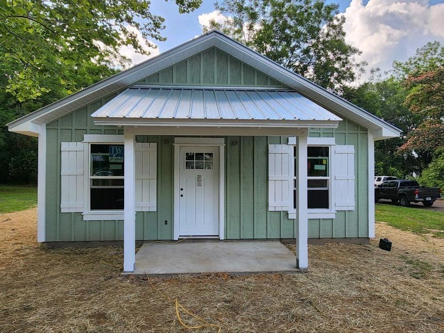 Looking for an opportunity in this economy and tired of paying rent? HERE is your BRAND-NEW house to call home!!! Located in Florala, this great 3/2 home offers all laminate flooring, granite countertops, along with the appliances and a metal roof! Alabama allows you the opportunity to buy with lower insurance premiums and lower taxes! This home is low maintenance and has all the upgrades to include amazing white kitchen cabinets adding to the openness of the home. Home offers an open concept with living room, dining room, and kitchen all open perfect for entertaining. The laundry room located in the rear of the home also opens to the back yard, and deck, perfect for afternoon fun. Corner lot on paved road! Home currently under construction. Colors subject to change.