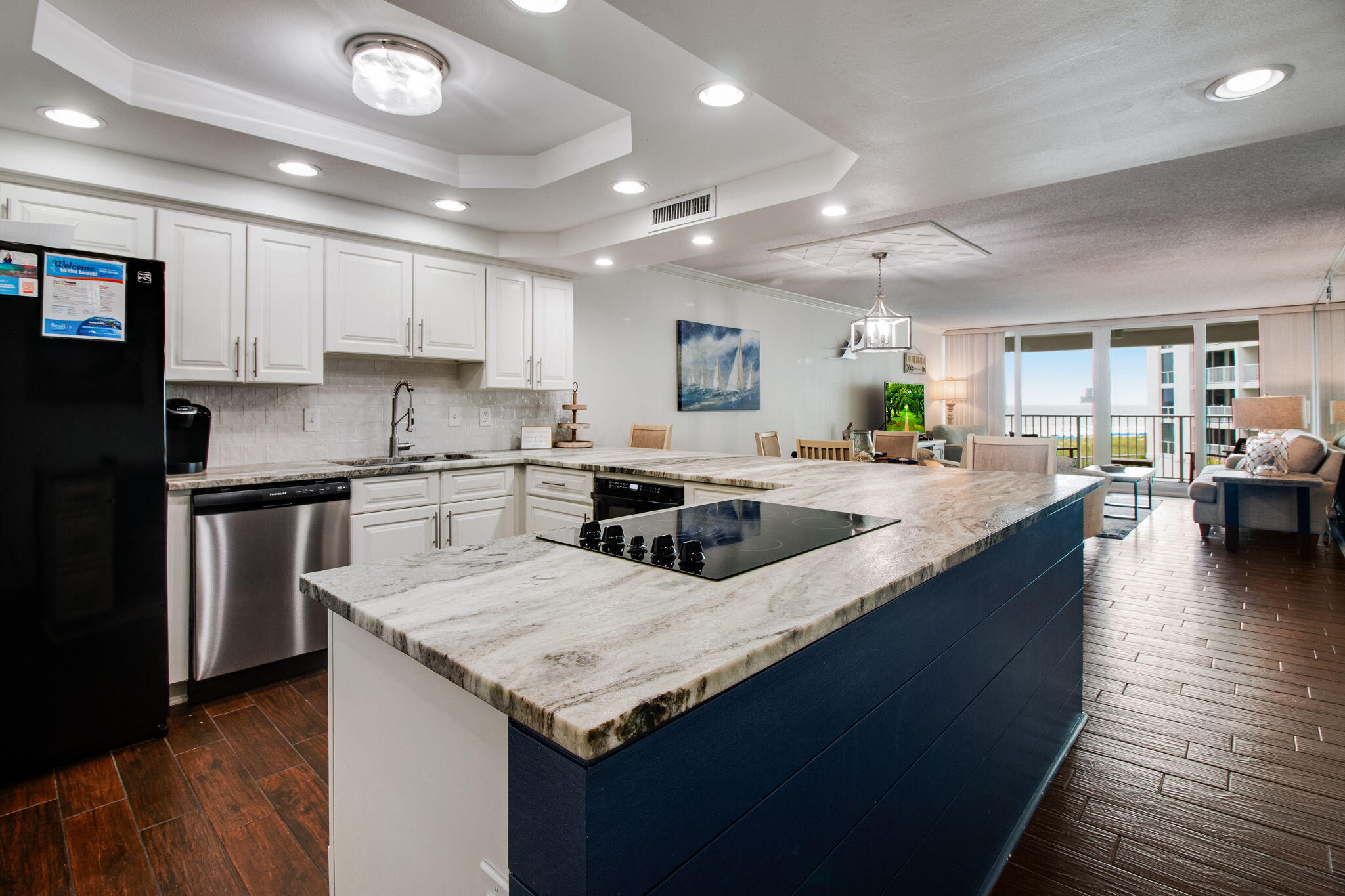 Turnkey Gulf-View Investment Opportunity at Shoreline Towers ! This fully furnished 2BR/2BA condo in a prime location with strong rental potential is move-in-ready. Unit 1035 features tile flooring, a modern kitchen with granite countertops, backsplash, and white cabinets. Located in a newly renovated ($25M) complex , including pool, parking lot and landscaping! Shoreline Towers offers resort-style amenities: private beach access, pool, tennis, sauna, and more. Just a few miles from Harborwalk Village - a top destination for dining, fishing charters, and entertainment. Impeccably maintained and ideal for short-term rental or second home. Whether you're searching for a primary residence, vacation home, or investment opportunity, this exceptional Gulf condo offers the ultimate in Florida coastal living.