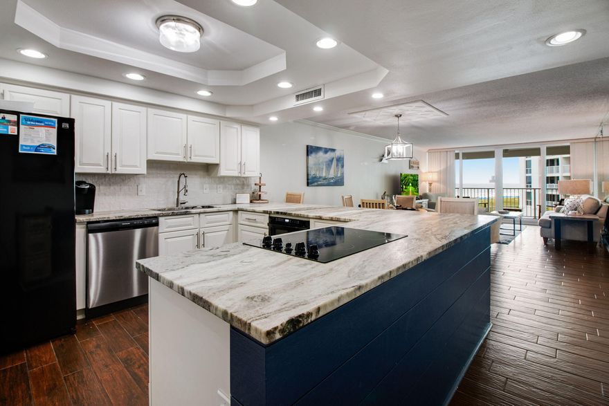 Turnkey Gulf-View Investment Opportunity at Shoreline Towers ! This fully furnished 2BR/2BA condo in a prime location with strong rental potential is move-in-ready. Unit 1035 features tile flooring, a modern kitchen with granite countertops, backsplash, and white cabinets. Located in a newly renovated ($25M) complex ,  including pool, parking lot and landscaping! Shoreline Towers offers resort-style amenities: private beach access, pool, tennis, sauna, and more. Just a few miles from Harborwalk Village - a top destination for dining, fishing charters, and entertainment. Impeccably maintained and ideal for short-term rental or second home. Whether you're searching for a primary residence, vacation home, or investment opportunity, this exceptional Gulf condo offers the ultimate in Florida coastal living.