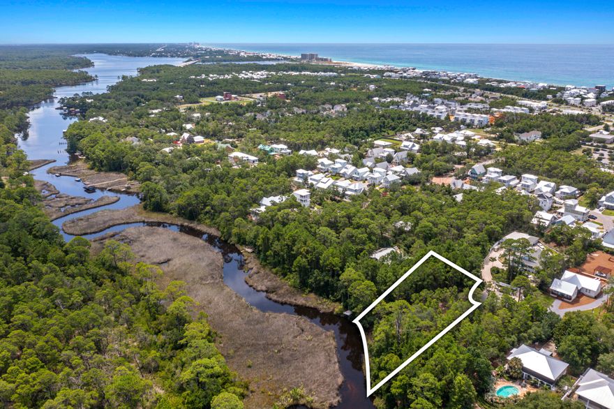 Discover this unique .56-acre waterfront lot leading to Lake Powell. Perfect for builders and dream home seekers, it features a cement boat ramp and dock, offering direct water access. This lot is free of HOA restrictions, providing flexibility and freedom.Located in a serene, picturesque setting, the property is close to 30 Avenue, 30A shops and restaurants, Rosemary BeachA(r), and Inlet Beach public beach access. The area is thriving with new residents, making it an ideal spot for investment. This exceptional lot is priced to sell and offers an unparalleled opportunity to build on the water.