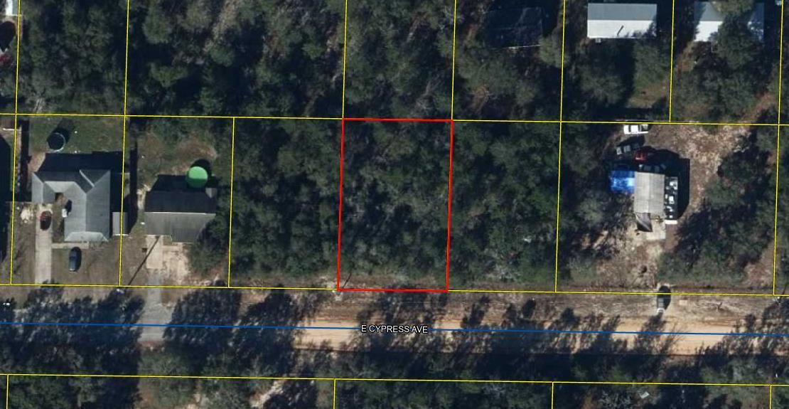 Entered for comp purposes only. .23 acre lot on a county maintained dirt road. Level & flood zone X. No restrictions. Public water available.