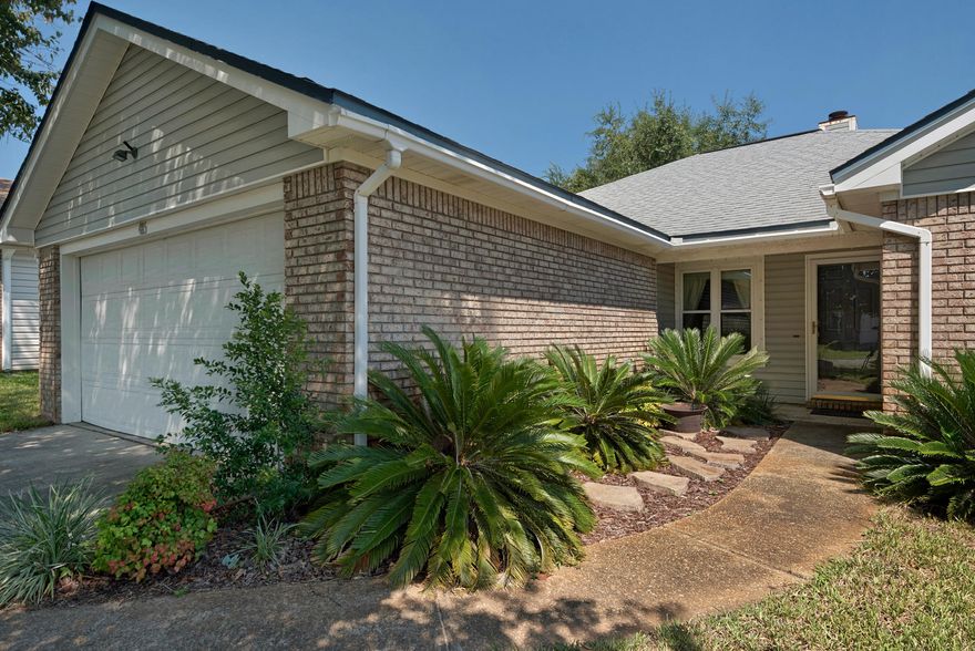 Fabulous 3 bedroom, 2 bath updated home located minutes from Hurlburt Field and the world's most beautiful beaches. Spacious living room with wood-burning fireplace, designer ceiling fan with recessed lighting. Wonderful kitchen features painted cabinets, Stainless Steel appliances, granite counter tops, breakfast bar and pantry. Dining area located just off kitchen with special feature a dog room with doggy door access to the 6' privacy fenced backyard. (You could convert dog room back into office.) The master suite features walk in closet, tiled shower, and double vanities. Split floor plan with two additional bedrooms and bath on the other side of the home. Window have lifetime warranty with Window World and all windows come with Hurricane Diamond Screen window covers for storm