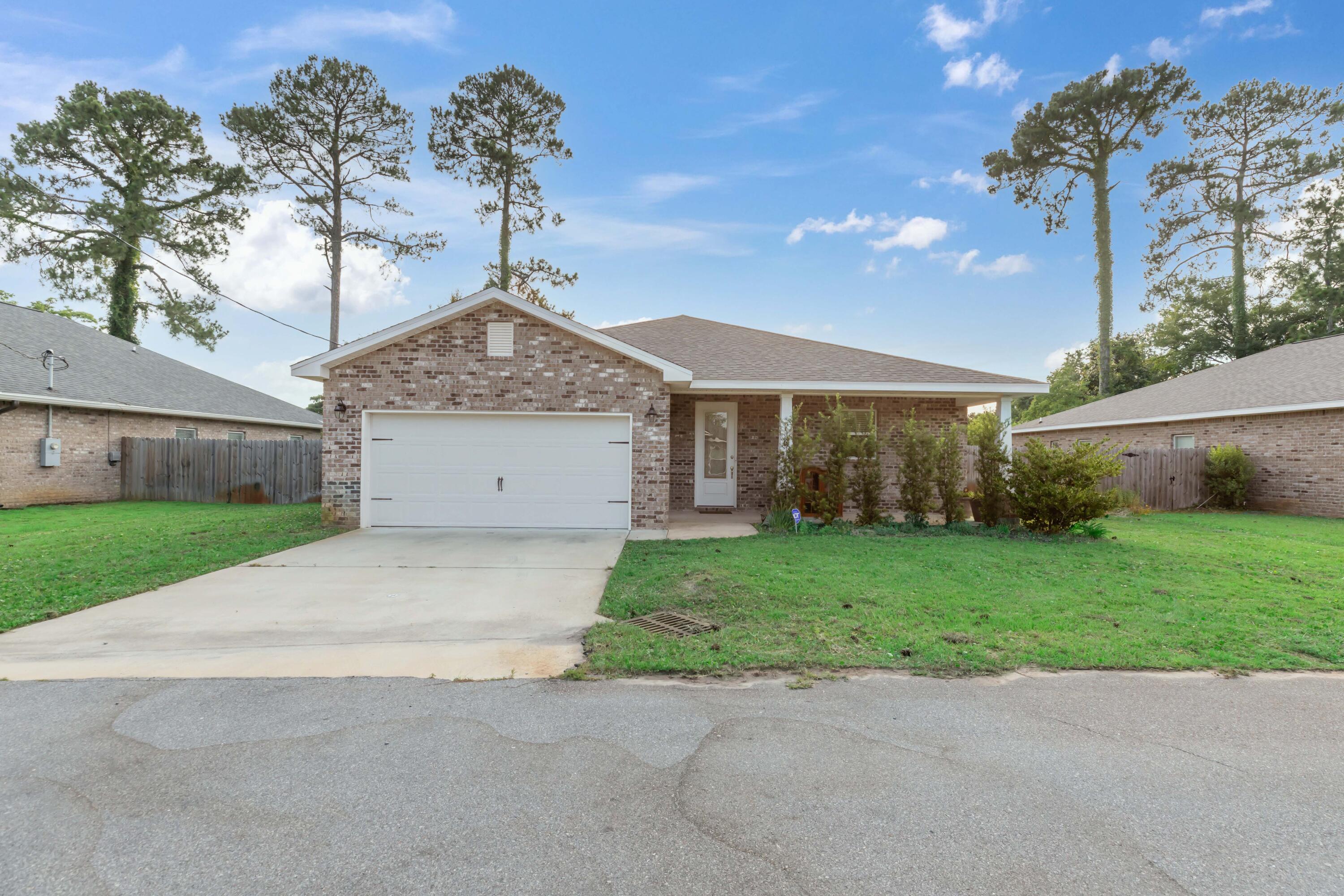 This newly constructed home offers the perfect blend of modern amenities and comfort. The large kitchen island and granite surfaces are ideal for both cooking and socializing. The separate laundry room adds a practical touch to your daily routine. Enjoy spacious bedrooms, with the master suite featuring a walk-in closet and a beautiful bathroom designed for relaxation. Step outside to your private, fenced-in backyard where a covered porch provides a great space for outdoor dining or simply enjoying the fresh air.