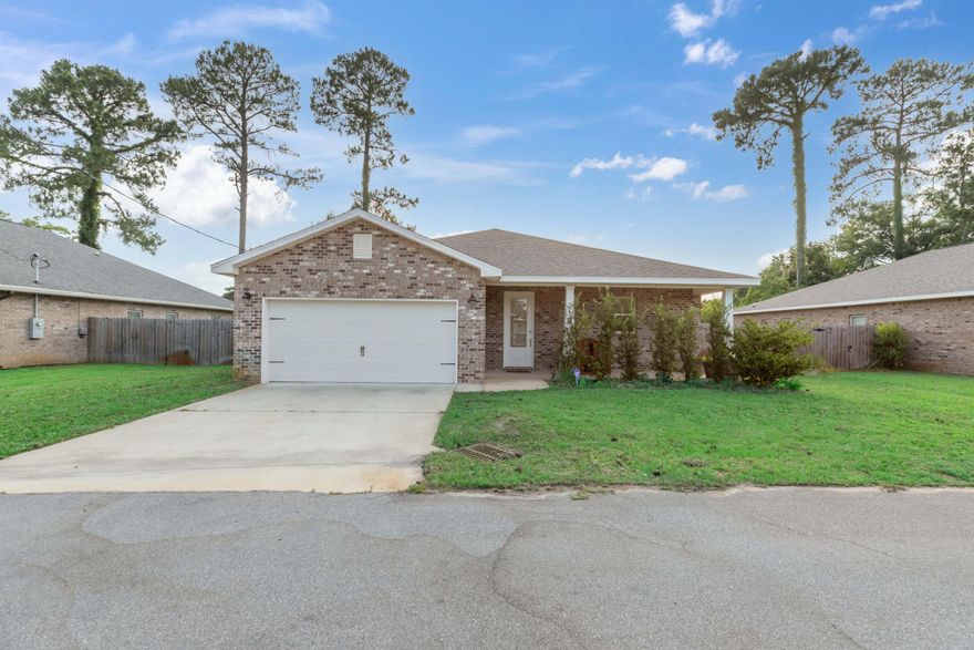 This newly constructed home offers the perfect blend of modern amenities and comfort. The large kitchen island and granite surfaces are ideal for both cooking and socializing. The separate laundry room adds a practical touch to your daily routine. Enjoy spacious bedrooms, with the master suite featuring a walk-in closet and a beautiful bathroom designed for relaxation. Step outside to your private, fenced-in backyard where a covered porch provides a great space for outdoor dining or simply enjoying the fresh air.