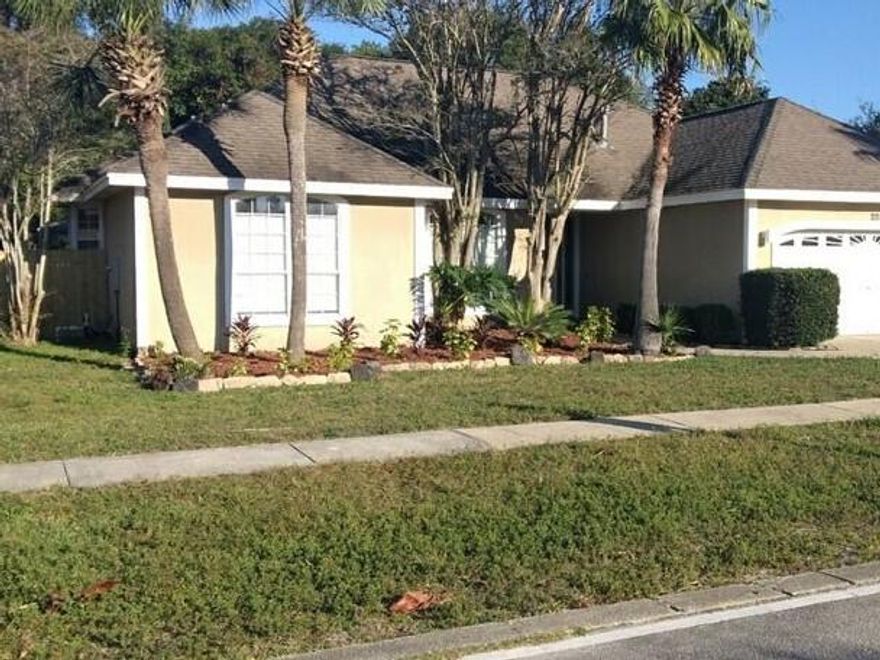 Single Family Home, great room with fireplace and split bedrooms. Kitchen features an island. Inground swimming pool with extensive pavers and Florida room great for outdoor entertaining. great room with fireplace and split bedrooms