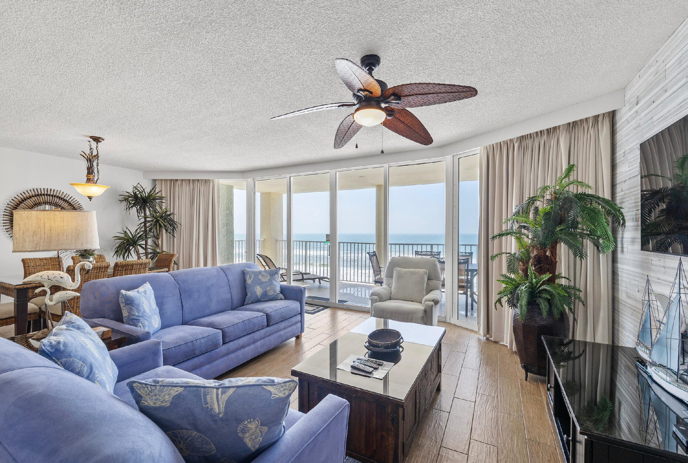 Long Beach T-3 Unit 703 is a beautifully updated 2-bedroom, 2-bathroom condo in the heart of Panama City Beach. Perched on the 7th floor, this Gulf-front unit offers unobstructed views of the emerald coastline through floor-to-ceiling glass that runs the length of the main living and both bedrooms.The open layout is ideal for entertaining, with coastal-inspired furnishings, tile flooring, and a bright, beachy vibe.Each of the two Gulf facing bedrooms has direct access to the expansive balcony. This condo sleeps eight, comes fully furnished and has a proven track record of strong, consistent rental income. With its unbeatable location, incredible amenities that consist of multiple pools, poolside snack bar and breathtaking views, unit 703 is a savvy investment, dreamy second home or both!