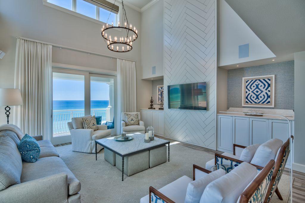 Under contract - accepting back-up offers. Unit 403 at Grandview Condo is an outstanding four-bedroom, four-and-one-half bath beachfront residence in Miramar Beach. This spacious 3,110 square foot condo has been completely renovated from top to bottom and includes beautiful tile work in each boutique bathroom and remote controlled shades in the living room. The open-plan living room offers an impressive double-height ceiling, chandelier and breathtaking gulf views from multiple aspects. Cerulean waters contrast with the sparkling white sandy beach to create a view straight from the pages of a luxury travel magazine. Entertaining in this amazing unit is a delight with a huge kitchen lined with gleaming white cabinets,