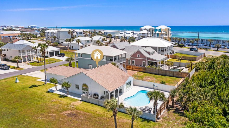 Enjoy the ease of single level living in this beautifully renovated home in a prime PCB location. The blend of indoor and outdoor space match perfectly as you flow from the open floor plan concept of living/dining/kitchen to the backyard with private pool and views of the neighborhood freshwater lake. Located approx 600' from the beach access, this home provides one of the most convenient locations in all of PCB, all while maintaining the exclusivity of a gated neighborhood and the peacefulness of a rental restricted community. The accommodating interior layout includes a beautifully remodeled kitchen, updated LVP flooring, spacious master suite with renovated bath, 2 additional bedrooms with shared bath, and a fantastic garage complete with TV hangout area and 1/2 bath! Shopping is just a