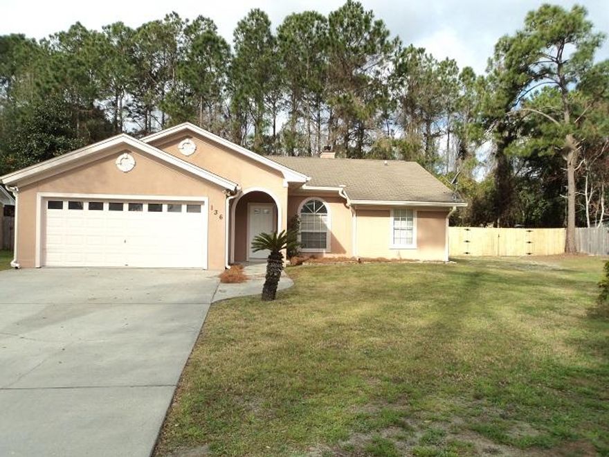 This well maintained Treasure Palms home is a 3 BR, 2 BA with 2,020 sq. ft. Beautifully tiled flooring throughout, fireplace, fully equipped kitchen, screened in back porch and large newly fenced in back yard. Split bedroom floor plan. Master bathroom with double sink vanity. This home is a must see. All dimensions are approx.