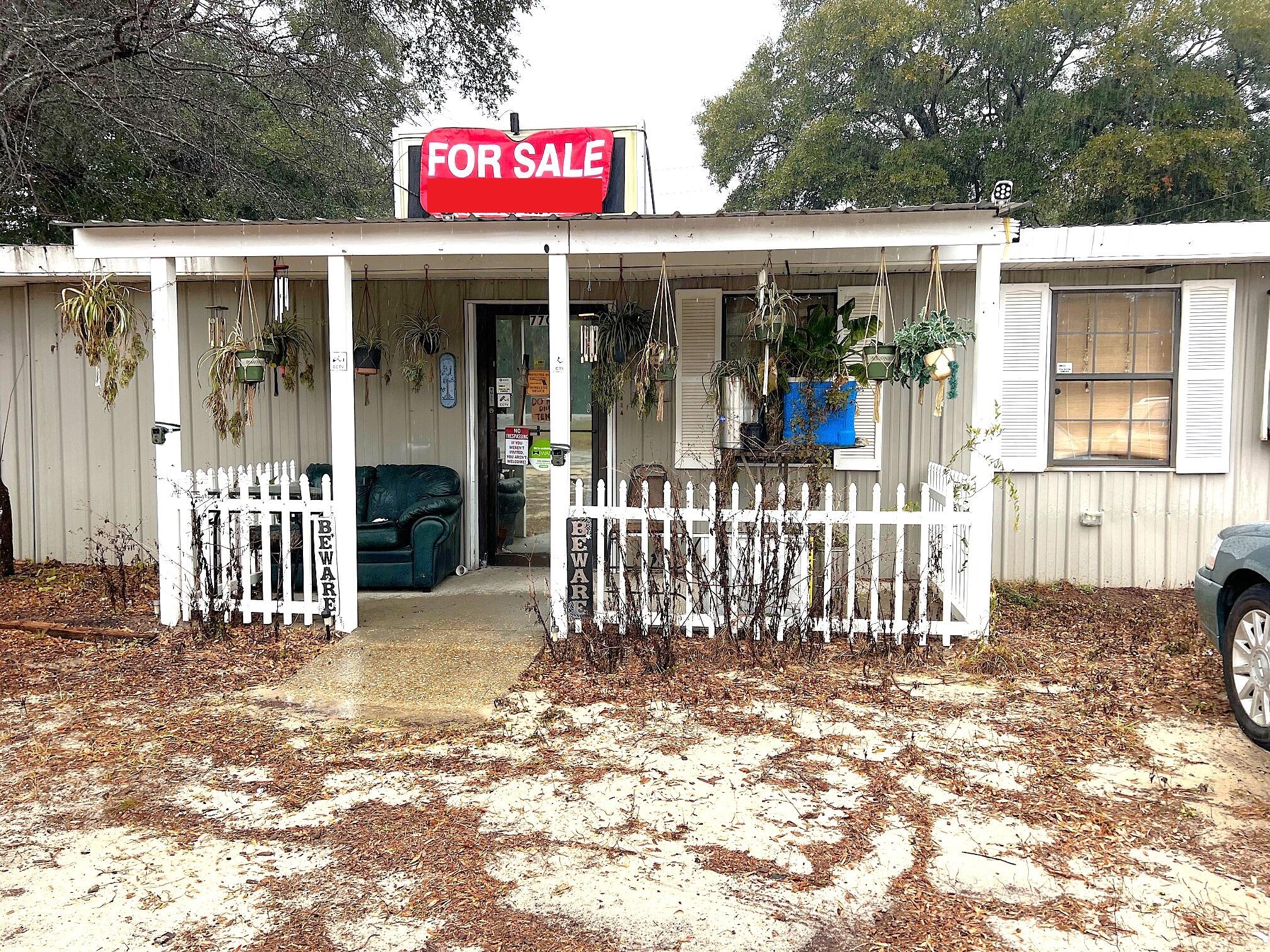 Former Restaurant Business on Hwy 90, in the Mossy Head area of Defuniak Springs.  Property is formerly known as Lily's Cafe.  Two lots totaling 3/4 ac and 162.9 ft on Hwy 90. All equipment will remain with the property.  Water is provided by Mossy Head Water Works. Structure is on septic tank. Seller is currently occupying the property as a residence, but all equipment is in place. There are two restrooms, dining area, kitchen and storage. Property is for sale only - no owner financing nor lease.  Buyer to verify intended use with Walton County Planning & Zoning. Appointment required.