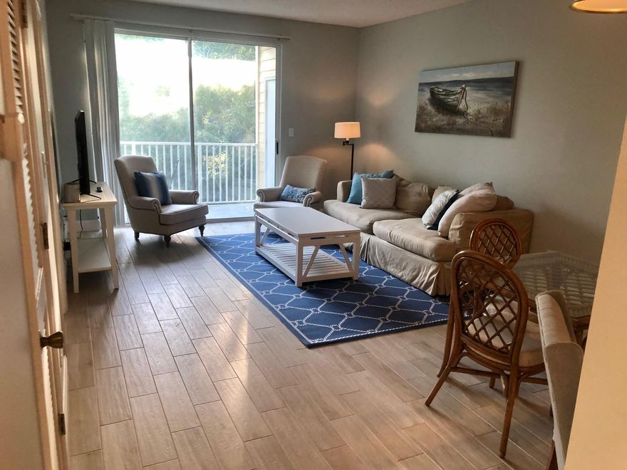 Freshly renovated and scheduled to generate significant rental income. Updated and remodeled 2 bedroom 2 bath condo conveniently located near Sandestin and Grand Boulevard. Low price for a full 2 bedroom, 2 bath, condo in the area finished at this quality level 2nd floor condo, includes washer and dryer. Pool & Fitness on site. New tile flooring really sets this one apart, Walk to Sacred Heart Hospital, Grand Boulevard stores, dinning and entertainment! Sold Furnished and Rentals ready to transfer to new owner. Generally booked and not available to show without negotiated contract. Sellers will entertain selling a 1/3 partnership. There may be a special assessment at Pointe of View related to exterior and stairs, seller is willing to pay the assessment if happens.