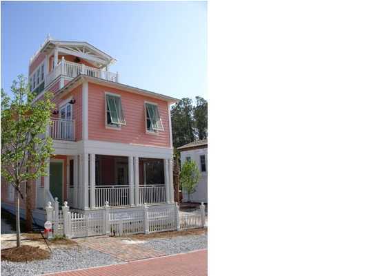 This house incorporates all the charm of a traditional Florida beach cottage, with the modern conveniences you would expect in a new home. Open floor plan on the first floor integrates Living/Dining/Kitchen spaces along with screened porch, laundry, and half bath with enclosed outdoor shower. Second level has master suite with large attached bath, guest bedroom and bunk room (4) sharing a large bath. Spiral stairs leads to tower room with three built in singles/sofa beds and porch with town views. Ladder to top deck for stargazing or sunning with gulf views. Custom cabinets and built-ins throughout, granite and marble counters, top of the line stainless appliances, tankless water heater, Brazilian cherry floors, and outdoor storage for bikes and beach gear are all benefits. House built
