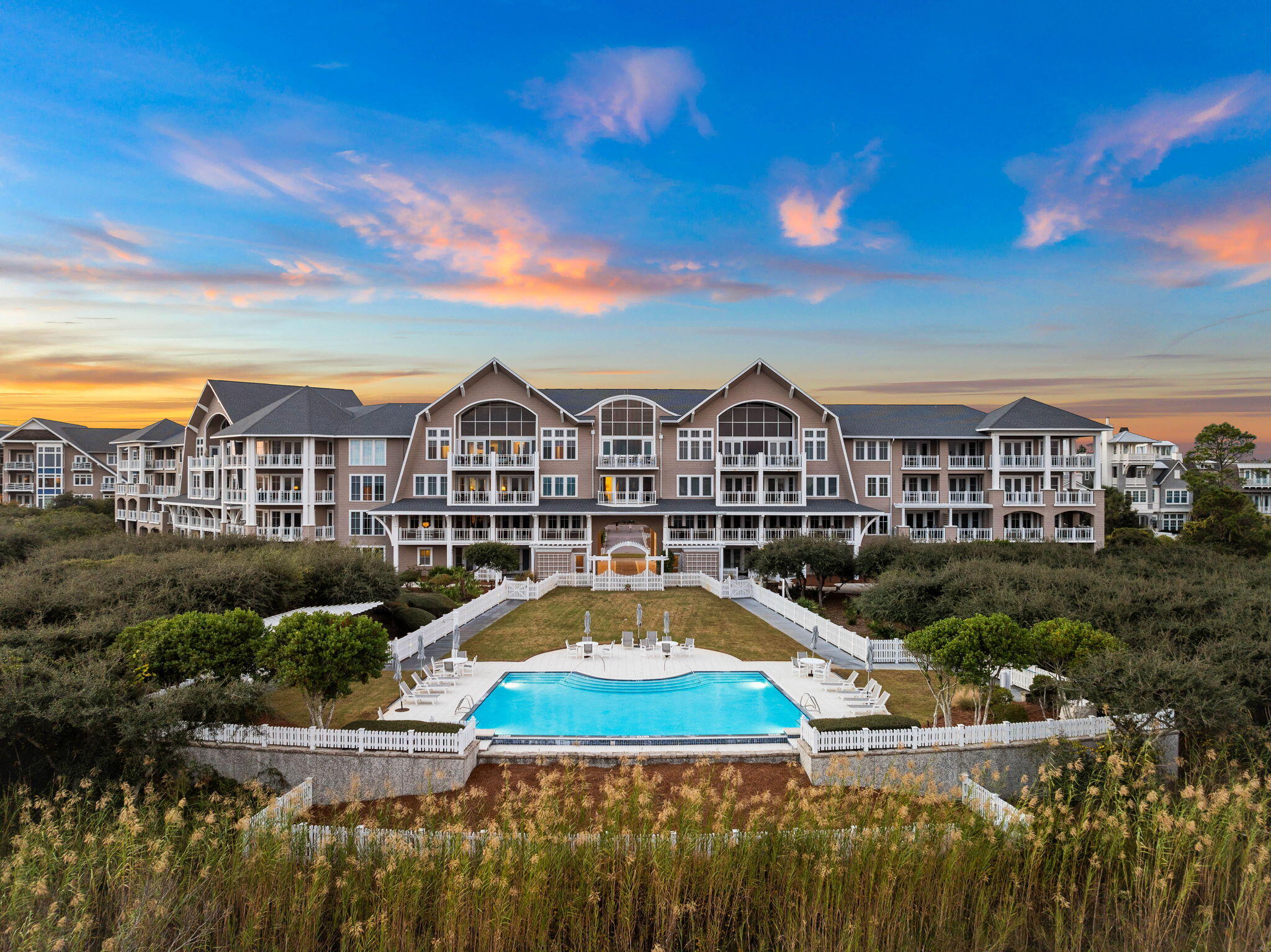 Welcome to Compass Point II, an exclusive coastal retreat perfectly situated on the pristine white beaches of the Emerald Coast in the highly coveted Watersound. Designed by renowned architect Graham Gund, this stunning Nantucket-style condo is 1 of only 25, offering an intimate and luxurious Gulf-front lifestyle. Meticulously updated, this home exudes timeless coastal elegance. Relax on your covered porch with breathtaking Gulf views and serene coastal dunes, or take the boardwalk to the crystal-clear waters of the Gulf. Amenities include a private pool, deeded beach access, and the option to join the exclusive Watersound Beach Club. Combining natural beauty, upscale features, and coastal charm, this property is ideal as a primary home, vacation retreat, or rental investment!