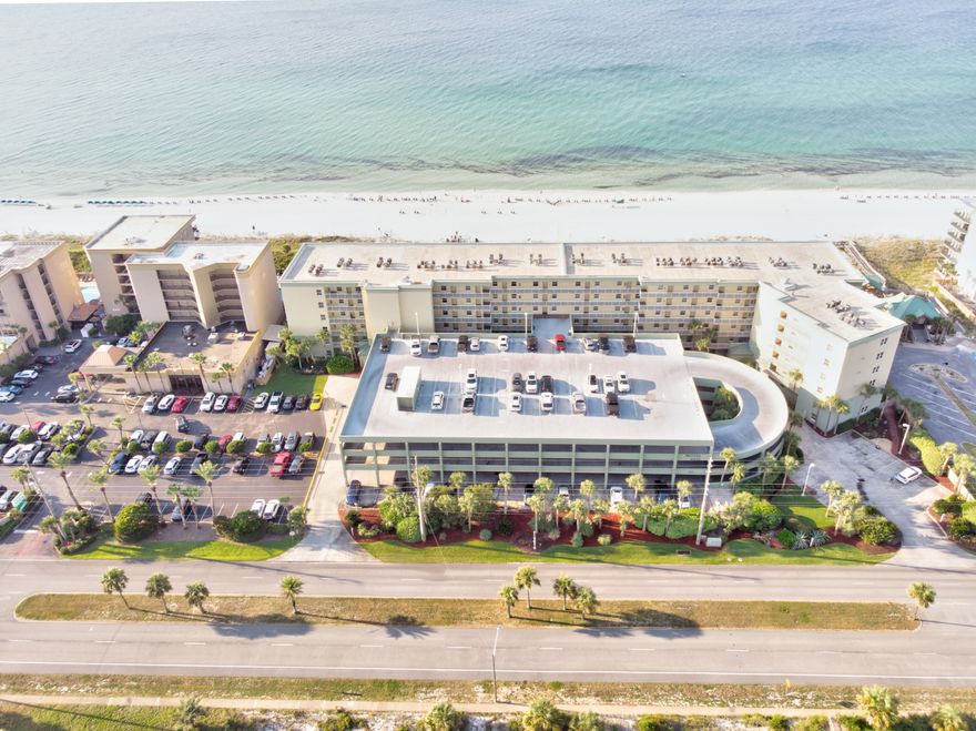 The wait is over! This completely remodeled and turn-key ready gulf front condo is the one you have been dreaming of. Enjoy endless gulf and sunset views from your oversized and private balcony...this is where DREAMS are made. The gorgeous kitchen boasts endless stunning quartz countertops w/ wrap around breakfast bar, custom porcelain backsplash, beautiful storybook white shaker cabinets, 2 pantries + so much more! Sold fully furnished - gracefully decorated w/ a coastal elegant NEW furniture collection and the tranquil decor provides the ultimate 'vacation' experience. Updated LVP flooring throughout and NO CARPET! Cozy up by your living room fireplace, enjoy endless beach time, or relax in the heated pool. Washer/Dryer in the unit. Never rented, but Boasting rental projections of $54k+!