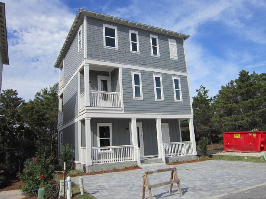 Walkable to the Gulf and the shops and restaurants of Gulf Place, this 4 bedroom, PLUS BUNK, 4.5 bath home is perfect place for a full time residence, second home or rental. 2 large bedrooms plus built in bunk room on the first floor with two baths. The kitchen with an 8' island, LR, DR, laundry and powder bath are on the second floor. The 3rd floor boasts the large master suite with gulf views plus a guest bedroom with an ensuite bath. Located in the gated development of Coastal Grove, this home will be decorated in coastal colors, will include extras such as granite tops, stainless appliances, hardwood floors (2nd and 3rd), porcelain plank (1st), outdoor shower, large paver parking area and rear patio for those lazy summer afternoon BBQ's. A must see