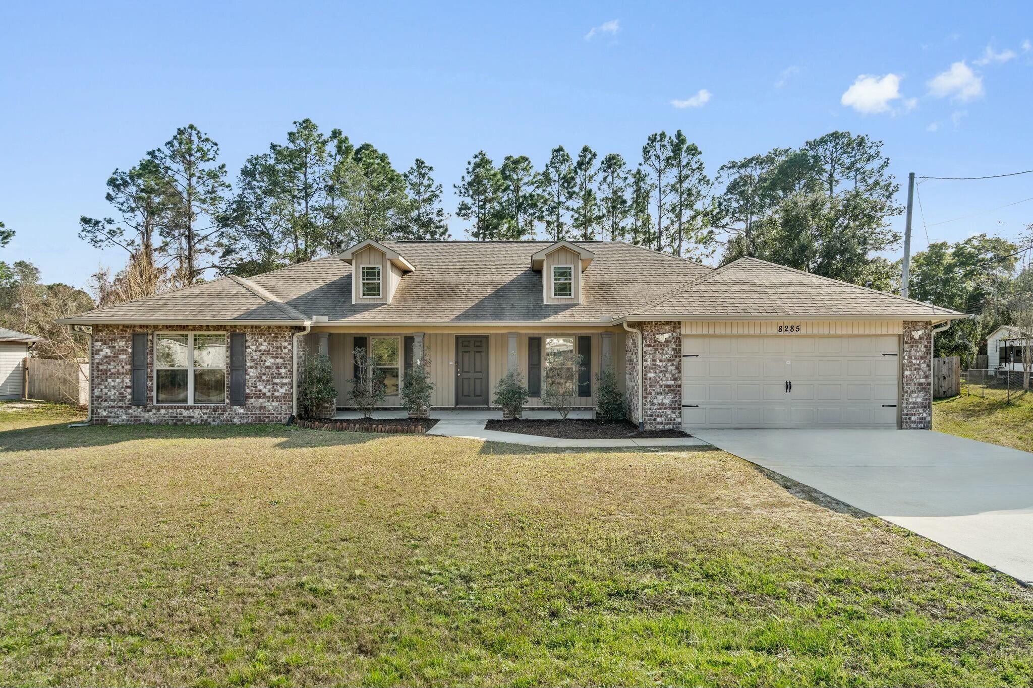 Welcome to this charming home in the heart of Navarre! Conveniently located close to shopping, beautiful beaches, and military bases, this 2,107 square foot home offers both comfort and convenience. Inside, you'll discover 4 bedrooms, 2 bathrooms, and an inviting open concept layout that's perfect for everyday living and entertaining.The spacious kitchen features attractive granite countertops, while a bonus room and formal dining area add versatility to the living space. Enjoy the practical split bedroom design and durable luxury vinyl plank flooring throughout main areas. The washer and dryer are included for added convenience.Sitting on a generous .46-acre lot, the fully fenced backyard provides excellent privacy. Additional features include wrap-around gutters, a French drain, well-irrigation system, and a storage shed. The garage comes equipped with extra insulation panels. This freshly power-washed home is ready for its new owner!