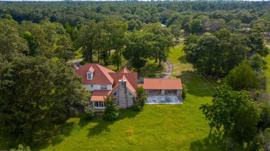 WOW! 10+/- Ac of beautiful pastures and a portion of larger pond! Bring your horses and fishing poles! This three-story home has so much to offer. The first floor includes the Great room, Foyer and Kitchen which leads to the Formal Dining room. GREAT!! For hosting a gathering! The Family room includes a beautiful stone wall fireplace, leading us to the Laundry room and Den, Perfect room to turn into an office or playroom! Let's take the stairs up to the Second floor, LOOK AT THAT RAILING!! Second Floor Includes Master bedroom, two Bonus rooms, one of which leads to the third bonus room on the third overlooking that gorgeous Property! Several porches around the house, one screen in attached to the house and the two-car garage. Also available with up to 76 Ac see mls#873741