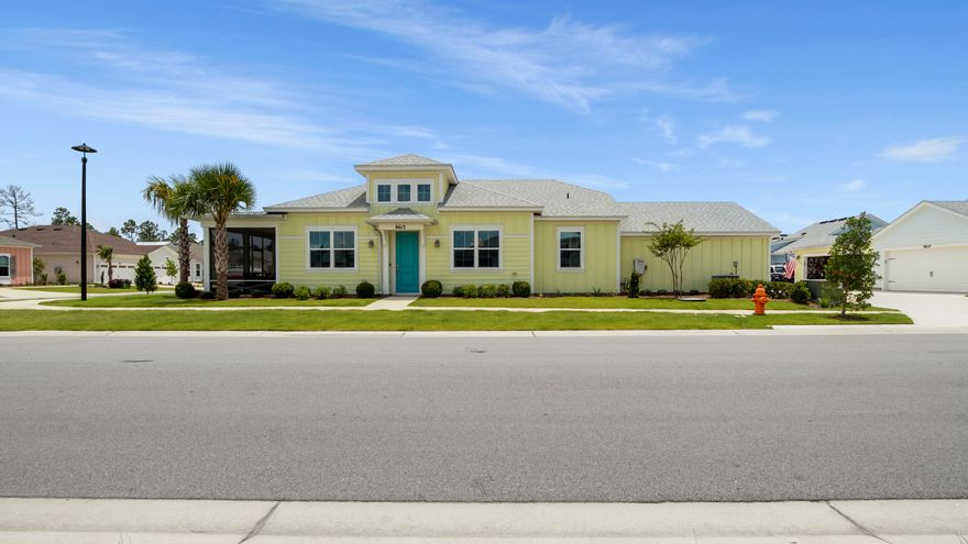 Welcome to this like-new Aloha floorplan located in Latitude Margaritaville, a gated 55+ community offering exceptional amenities and an active coastal lifestyle. This immaculate residence sits on a premium corner lot and features 2 bedrooms and 2 bathrooms, plus an additional flex-space perfect for an office, hobby room, or den. With over $75,000 in upgrades, this home showcases luxury vinyl plank flooring and recessed lighting throughout for a modern and cohesive feel. The kitchen is a chef's delight, featuring a spacious island, stainless steel appliances, a tiled backsplash, pantry, and beautiful lighted glass-front cabinetry with soft close doors.  The bathrooms are equally impressive, with quartz countertops and showers that are tiled all the way up to the ceiling for a seamless, upscale look. Enjoy outdoor living year-round on the enclosed patio. The two-car garage is finished with epoxy flooring and includes a 20 amp outlet, keeping your car protected from the elements and your golf cart fully charged. Located within a vibrant community offering pools, fitness centers, restaurants, entertainment, and tennis or pickleball, this move-in ready home is perfect for enjoying everything Latitude Margaritaville has to offer.