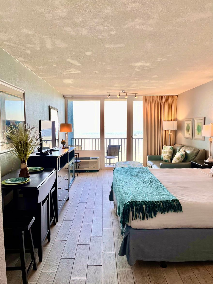Over $34k in rental income for 2021!  Beautiful Bay view and Sandestin Marina views from this 6th floor studio in Bayside. Recently updated tile floors and bathroom renovation. Located near the Links Golf Course, Linkside Conference Center, Sunset Bay Cafe, and Sandestin Fitness Center. You will have easy access to the onsite tram that will take you to the beach and the Village of Baytowne Wharf to enjoy restaurants, shopping and entertainment. All utilities are paid via the quarterly Association Fees.