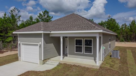 Photo of 320 Woodlands Boulevard, DeFuniak Springs, FL 32433 (MLS # 987577)