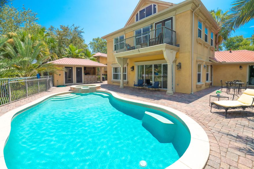 Welcome to this bayou front 5-bedroom, 6-bathroom home located on Marler Bayou in the beautiful city of Destin, Florida. This luxurious waterfront property is truly a dream opportunity for anyone looking for a spacious and comfortable home with amazing amenities on the water.

The main house boasts 4 spacious bedrooms and 4 luxurious bathrooms, cherry hardwoods, iron staircase, multiple living areas for entertaining, and plenty of storage space. The bathrooms feature elegant marble countertops, walk-in showers, and a jacuzzi tub and double vanity in the primary.

Additionally, the mother-in-law suite features a fully equipped kitchen, one comfortable bedroom, and adjoining bathroom, making it perfect for guests or even as a rental unit. The property also features a stunning outdoor area, complete with a pool, jacuzzi, outdoor kitchen, outdoor half bath, and sauna. This area is perfect for entertaining guests or simply relaxing and enjoying the Florida sunshine. The pool area is surrounded by lush landscaping, providing a serene and private oasis for you and your guests.

The home also features a recently finished dock and boat slip, allowing you to easily access the beautiful waters of Marler Bayou. You can spend your days boating, fishing, or simply taking in the stunning views of the bayou. The two-car garage provides ample storage space for your vehicles and outdoor equipment.

Conveniently located just a short distance from HarborWalk and Crab Island, this home offers easy access to some of Destin's best restaurants, shops, and attractions.

Overall, this stunning 5-bedroom, 6-bathroom home on Marler Bayou in Destin, Florida, is truly a one-of-a-kind property that offers everything you could want in a luxurious waterfront home.