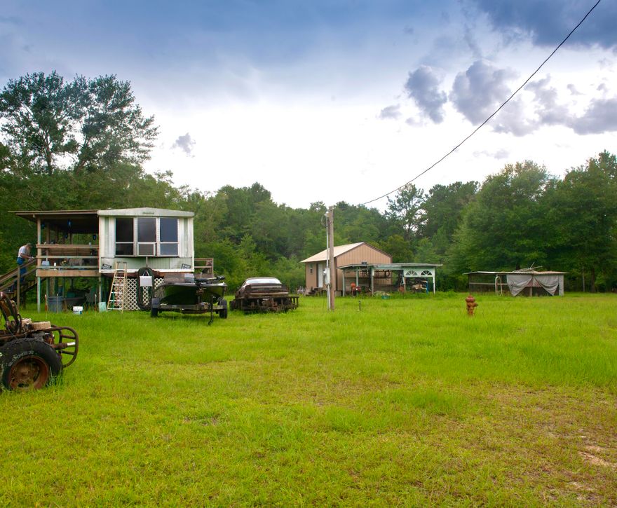 A HUNTER'S PARADISE!!! A stunning 17.24 acres filled with wildlife and endless possibilities! Feel secluded on this beautiful piece of property, but still enjoy your open space with 4 cleared acres. This land has plenty of wildlife to view, natural gas, electricity and a septic tank that is ready for you! You have deeded access to Shoal River and the river runs straight through the property that roughly 5 acres surrounds. There is a mobile home on stilts that has no value.