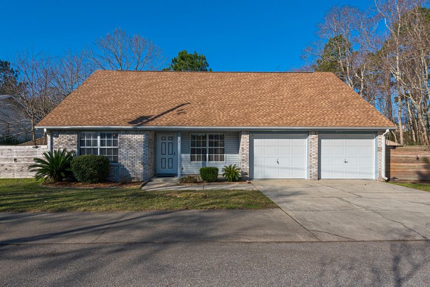 Ready to move?? Located SOUTH of Hwy 98 and within 5 miles of Hurlburt Field, this meticulously maintained home has a private location, updates throughout, and a unique floor plan for families or room mates! As you step inside this fabulous property you'll notice vaulted ceilings, updated fixtures, large rooms, and fresh paint! The family room is generously sized and serves as the central location for the home while the dining area and kitchen flow together to create a great entertaining space. The kitchen is updated with newer appliances, granite countertops, stainless sink, and grey cabinets! Unique in this price point, this home boasts 3 full baths to accompany each of the 3 bedrooms! 2 bedrooms downstairs each have their own full bath and the upstairs bedroom includes a fully remodeled