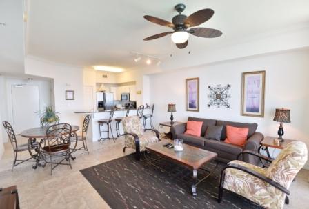 Put your stylish touch on a penthouse 1 bedroom 2 bath with bunk area condo in a premier resort with some of the best amenities in all of Panama City Beach! Tidewater Beach Resort Unit 3009 is Penthouse level unit, one of the most sought-after floor plans (L plan) at Tidewater featuring 9 -1/2 foot ceilings, travertine and ceramic tile throughout, gulf front master bedroom showcasing stunning Gulf views from the floor to ceiling windows, open living floor plan, stainless appliances in the kitchen, granite counter tops, just to name a few features. Tidewater is a vacation rental dream with 2 outdoor pools with hot tubs, heated indoor pool, onsite restaurant, tiki bar, gulf front fitness room with indoor Roman spas, full movie theater, and did we mention the ease of access to the airport and