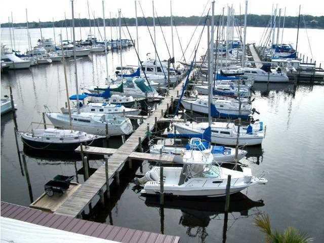 WORK, PLAY, BOAT and LIVE!!! Waterfront opportunity in the heart of Niceville, Florida! This piece of paradise is settled on the Boggy Bayou just a few nautical miles north of the pass to the Gulf of Mexico. An exquisite deep water boat dock featuring 48 boat slips, a covered deck with gazebo that is equipment with picnic seating area, ice machine, bathroom facilities and parking area designed with elegant pavers. The upland includes a three story commercial building which has approx 1,800 square feet of office space including a loft, kitchenette and breath taking views of the Bayou. Downstairs features a 2 bedroom furnished condo.