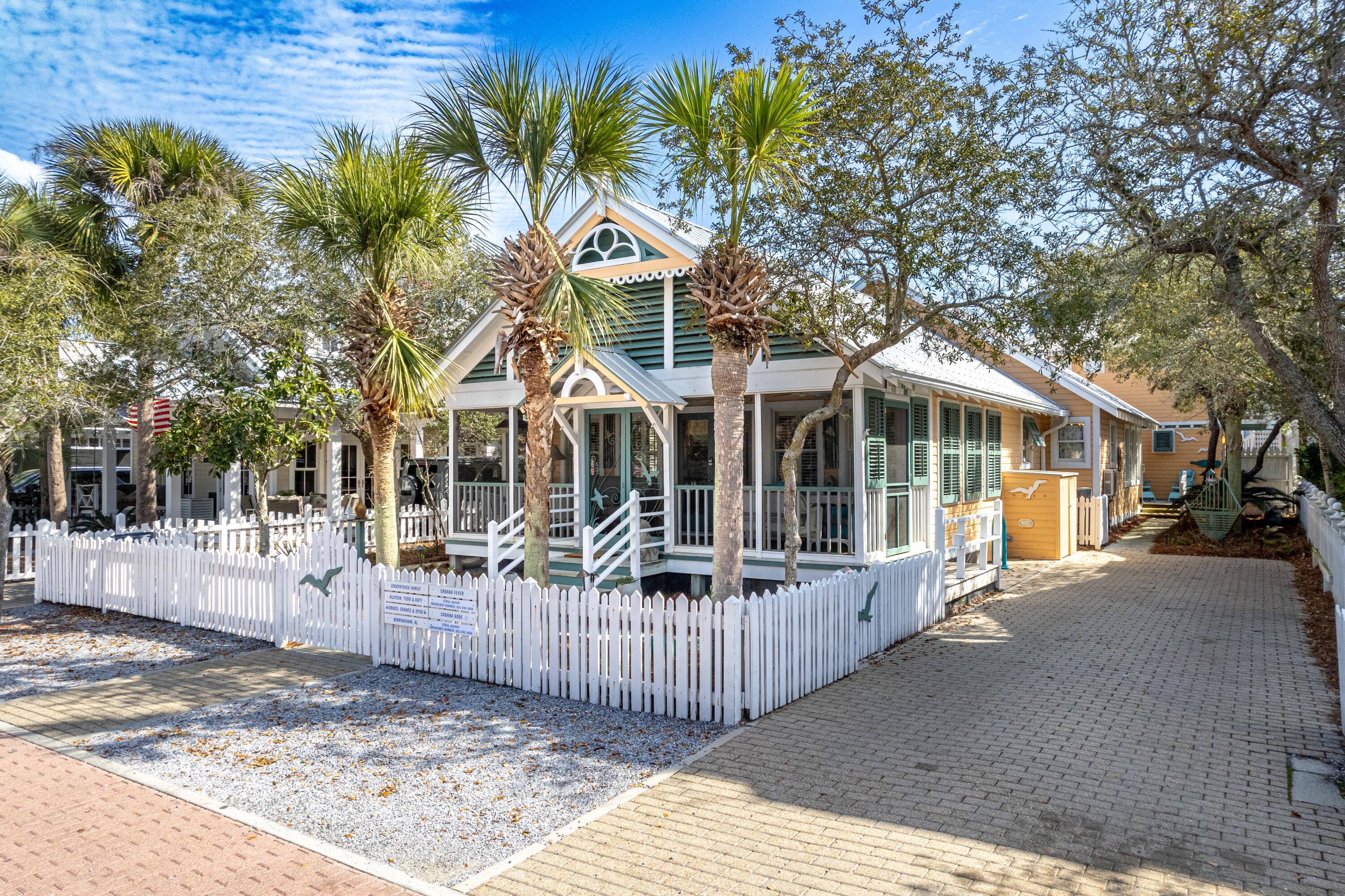 It's location, location, location! Nestled three lots back from iconic scenic 30A, these immaculately maintained beach cottages are a stone's throw from the beach, with the west-end family pool in the opposite direction.The one-level main house offers easy living with three bedrooms, two and a half baths, a vaulted ceiling, and a fireplace for cozy coastal nights. Updated bathrooms and kitchen defy the one-of-a kind vintage Florida charm of this much-loved beach home. A bunk room with four bunks, and the guest bedroom share a Jack & Jill bathroom. A well-placed skylight floods the common bathroom with sunlight. The master suite's bathroom has been lovingly remodeled with a separate shower and soaking tub to satisfy everyone's whim. The generous front screened porch is the perfect spot to relax and visit with neighbors as they stroll to the beach. With high ceilings, ceiling fans, and beautiful vintage wicker furniture, it's an inviting space that blends comfort with timeless style. Whether you're people watching, or enjoying a glimpse of the iconic Truman House just across the street, this porch offers the ideal place to unwind. A large attic offers plenty of storage space. And, got beach toys? Keep them securely stowed away in one of several outdoor storage units. Plenty of deck space connects the main house to the guest cottage and creates an outdoor living area. An over-sized driveway can comfortably accommodate a couple of vehicles.
The separate guest cottage features one bedroom, one and a half baths, and is perfect for overflow family, visitors, or rental income. This precious cottage has everything one needs for the ideal beach getaway!
Both homes are in excellent condition, fully furnished, and showcase a vintage-Florida interior, with original antique and contemporary artwork, decor, and furnishings. Updated kitchens and bathrooms provide modern convenience while maintaining classic charm. This is a rare opportunity to own a turnkey beach retreat in a prime location.