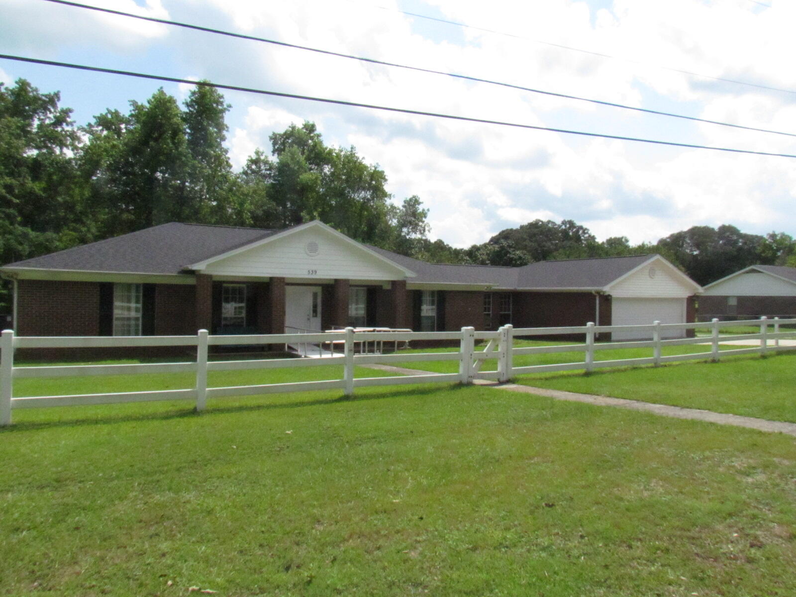 Quiet country living in this all brick ranch style home. This is a 3-4 bedroom house with 2 bathrooms, large open living area with a beautiful fire place. Split bedroom design, the master bedroom size has a large add on room that could be used as a 4th bedroom or as an office or living area for a master suite. Oversized garage big enough for a boat and a car, if needed. Large lot with plenty of room for entertaining, includes a large shed and multi level decking off of the kitchen. Home will be sold as is. HVAC 2019, roof 2021 Call for an appointment to view