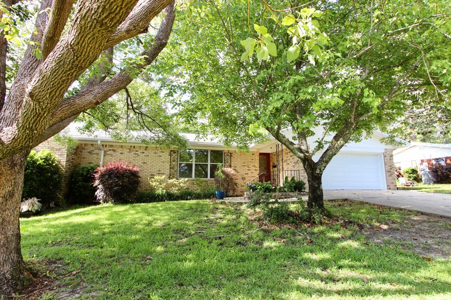Under contract accepting back-up offers. Desirable Poquito Bayou Gem!! Welcome to this charming all-brick 4-bedroom, 3-bath home nestled in the highly sought-after Poquito Bayou neighborhood. Perfectly located and packed with upgrades, this home combines comfort, functionality, and Florida charm. Recent updates include a A/C (2022), all new copper wiring, new plumbing, and a newer hot water heater--giving you peace of mind and energy efficiency. The roof was done in 2018. The washer and dryer stay, with the dryer being a convenient ventless model. The thoughtfully designed split-bedroom floor plan offers privacy and space for the whole family. The master suite features a sunken tub, double vanities, and sliding glass doors that lead out to your own private brick atrium. a perfect retreat for morning coffee or evening relaxation. The kitchen opens up to a spacious living/dining area, ideal for entertaining or everyday living. Situated on one of the highest lots in the county (approx. 35'), this property boasts a fenced backyard with a large storage shed, fig and blueberry trees, and a vegetable and herb gardena true gardener's delight. There's also plenty of space for a pool! Don't miss your opportunity to own this well-maintained home in a prime location. Schedule your private showing today!

