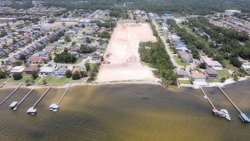 Welcome to Wild Heron- a Coastal Living community located in beautiful Navarre, Florida. This newly developed gated community features 35 individual home sites boasting seven brand new floor plans inspired by the timeless aesthetic of classic single style homes up and down the American coast.Community features will include gate access, mail room, 'Pool Park' pavillion, 'Shore Park'' beach access and dock, rear- loaded garages, community landscaping, sidewalks and street lighting.