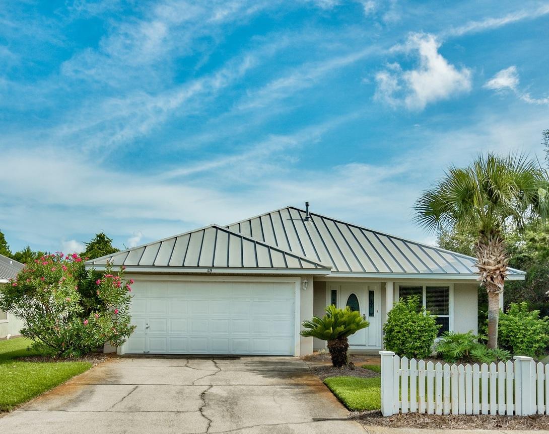 A savvy investment property, second home or full time residence, this MOVE-IN READY property gives you the benefits of RESORT STYLE LIVING in a single family home with a 2-CAR GARAGE in a secure, GATED, BEACH FRONT COMMUNITY. You're welcomed through the front door into a multi-purpose room use this space as an office, second living area with a sleeper sofa for additional guests, or as a formal dining space. The SPACIOUS KITCHEN has plenty of storage, and cabinet space, pantry, breakfast bar, and opens onto the living area with FIREPLACE. Extend your living space outdoors with a LARGE DECK and PRIVATE BACK YARD space. Unlike most other Maravilla cottages, you DO NOT back up to another home. SPLIT BEDROOM floor plan the Master boasts