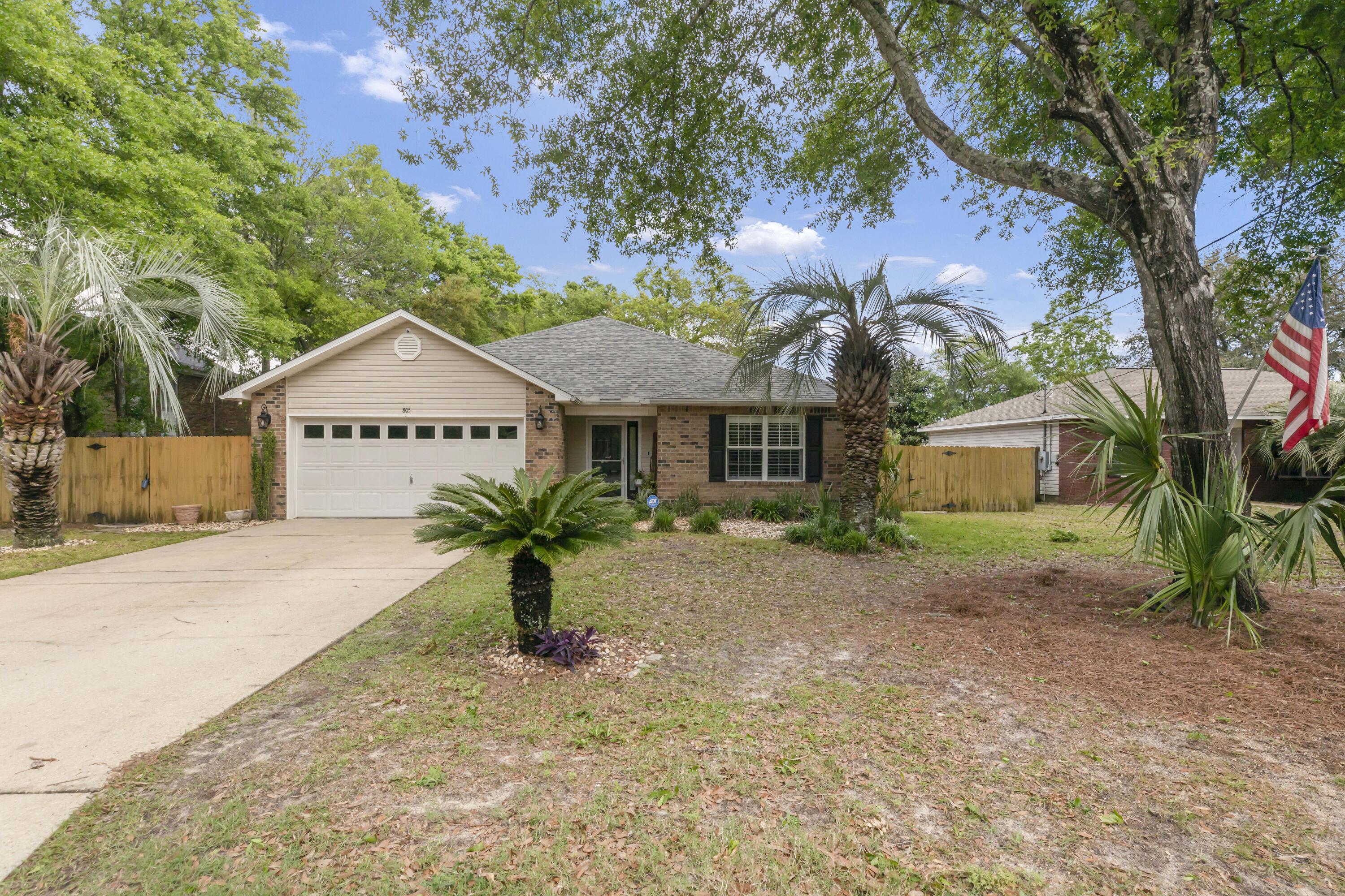 Centrally located in Fort Walton Beach, this immaculate home offers comfort and convenience! The roof (2023), water heater (2021), and HVAC (2020) offer peace of mind. Enjoy the luxury of NO carpet throughout the house, perfect for easy maintenance. Additional features include EV hookups, a transferable termite bond, and a washer/dryer that conveys. The kitchen boasts soft-close cabinets, a breakfast bar, and plantation shutters adorn every window. The split floor plan provides privacy, while recessed lighting with smart switches adds modern convenience. Retreat to the master suite which includes a tray ceiling with crown molding. Minutes away from Walmart, military bases, and shopping, this home offers the perfect blend of comfort and accessibility. Call me to schedule your showing today