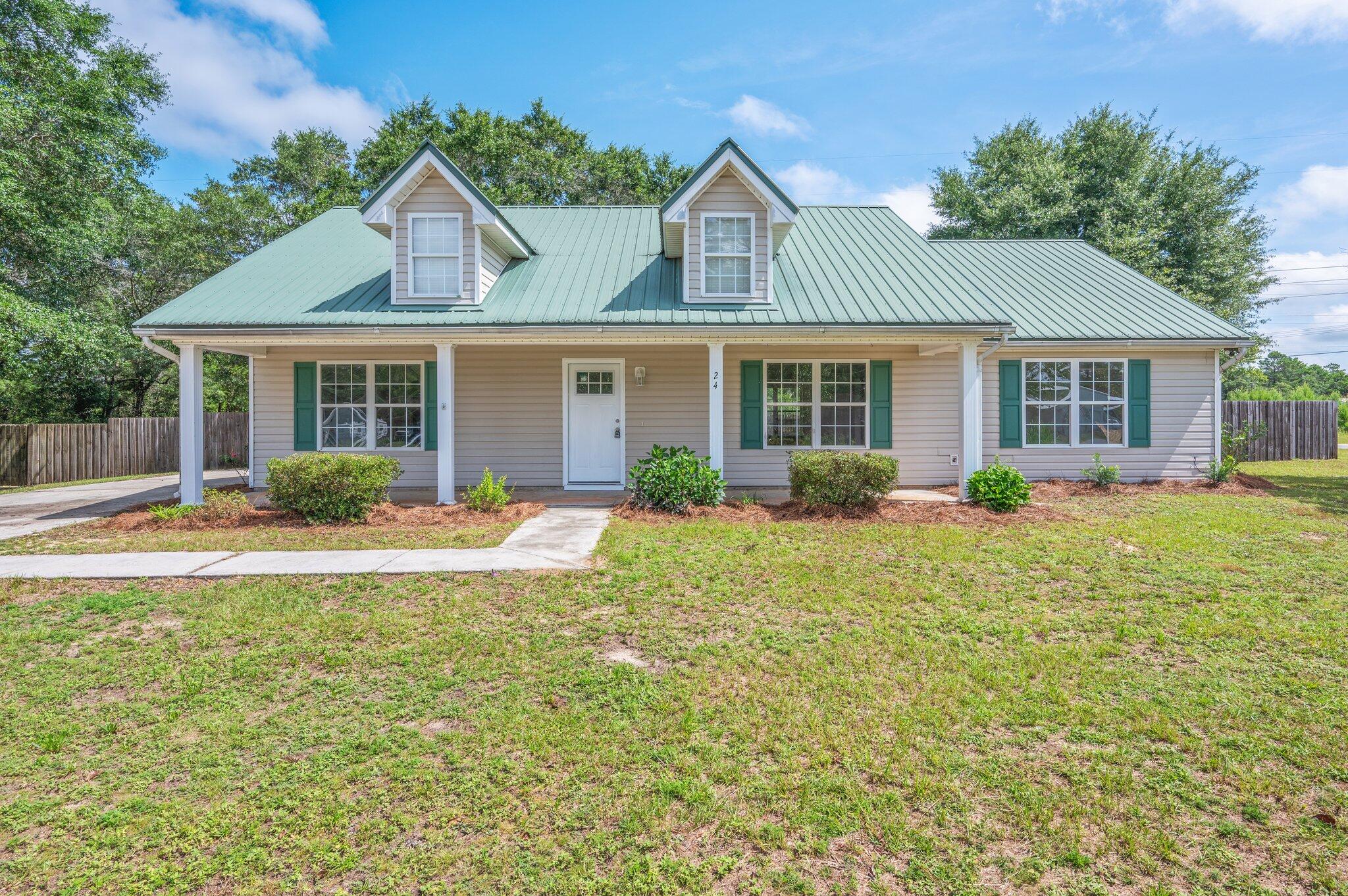 This beautifully renovated 3-bedroom, 2-bath home offers comfort, space, and convenience--all just minutes from DeFuniak Springs and I-10. Situated on two lots totaling nearly half an acre, this corner-lot property provides plenty of room to enjoy both indoors and out.Built in 2007, the home features a desirable split floor plan with a spacious master suite, complete with a large walk-in closet and a newly updated master bathroom shower. Renovations completed in 2025 include all new light fixtures throughout, new exterior doors, fresh paint, brand-new flooring, a new hot water heater, and updated stainless steel appliances along with a new kitchen sink.Major systems have also been recently upgraded: the roof was replaced in 2015, and the HVAC system was replaced in 2020.