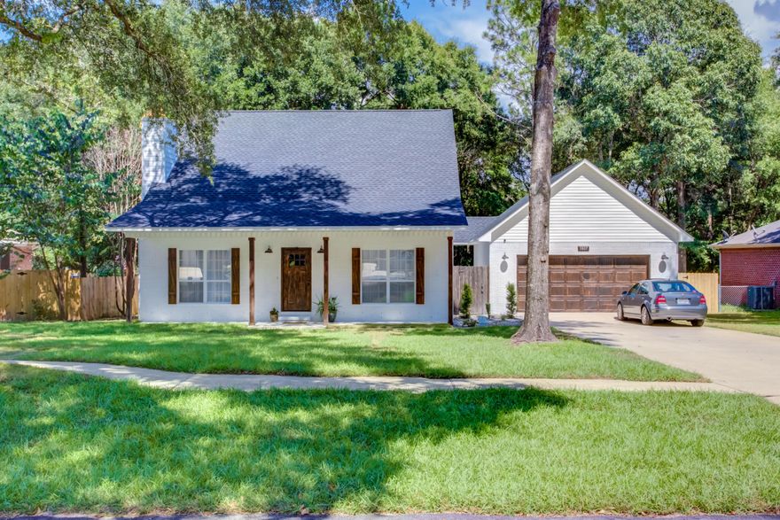 Your GORGEOUS renovated Southern Living home awaits! Top-Bottom, Inside and Out is new and upgraded. Stunning kitchen with Quartz counters, subway tile backsplash, Maple cabinets w/dovetail and soft-close drawers, Whirlpool appliances and a center island for entertaining. Oak Hardwood flooring throughout, carpet in the bedrooms, and upgraded tiled floors in the bathrooms w/Carrara marble vanities. Large Master Suite features custom vanity and mirror, tiled shower, whirlpool tub, and 10x10 walk-in closet. Every surface of this home has been touched with attention to detail. Situated on a level lot and a Freshly landscaped yard w/mature trees providing lots of shade to enjoy your outdoor lifestyle and privacy fenced back yard. Oversized 23x23 garage is detached with a breezeway. See TODAY!