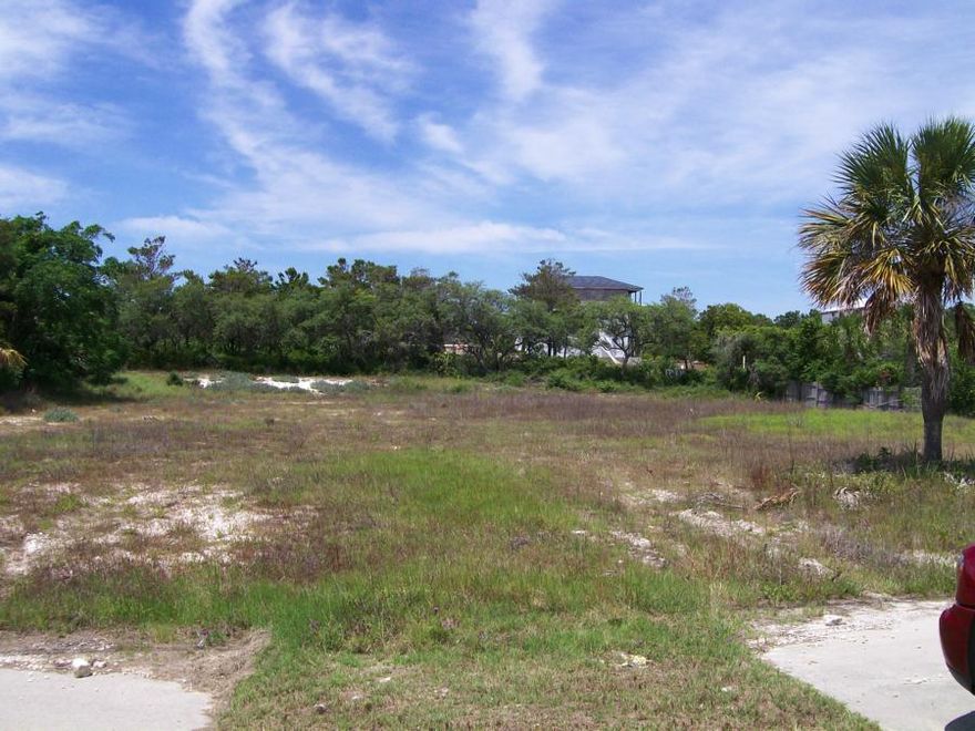 $50,000 price drop! Motivated Seller for year end closing!!! Bring an offer!Located on the first block entering Walton County from Bay County in Inlet Beach. Positioned between the old Spicy Noodle restaurant (recently purchased) and Terrace restaurant.