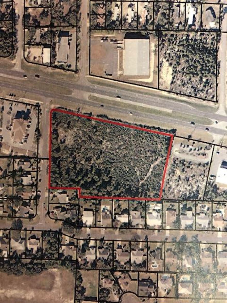 Commercial land lot. Per seller 4.68 acres and zoned C-3. Located on the west end of PCB near 30A. Great Location.