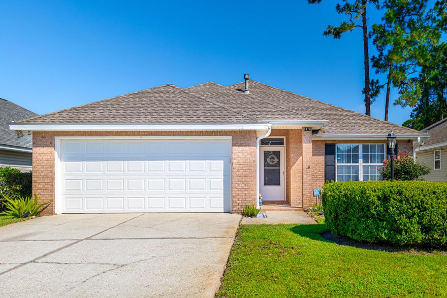 Fantastic home with many new updates located in the heart of Bluewater Bay (Niceville). All new flooring LVP throughout the entire house with a split layout. Walking in the front door, two bedrooms to the right share a hallway and a bath. The large master bedroom sits at the back of the house with separate shower, bathtub, and his and her walk-in closets! New systems include 2020 HVAC and 2022 gas water heater. Roof was recently replaced in 2018. Back patio has a gas stub for a tankless grill and the yard is complete with new sod and a new fence. Updated garage door also.