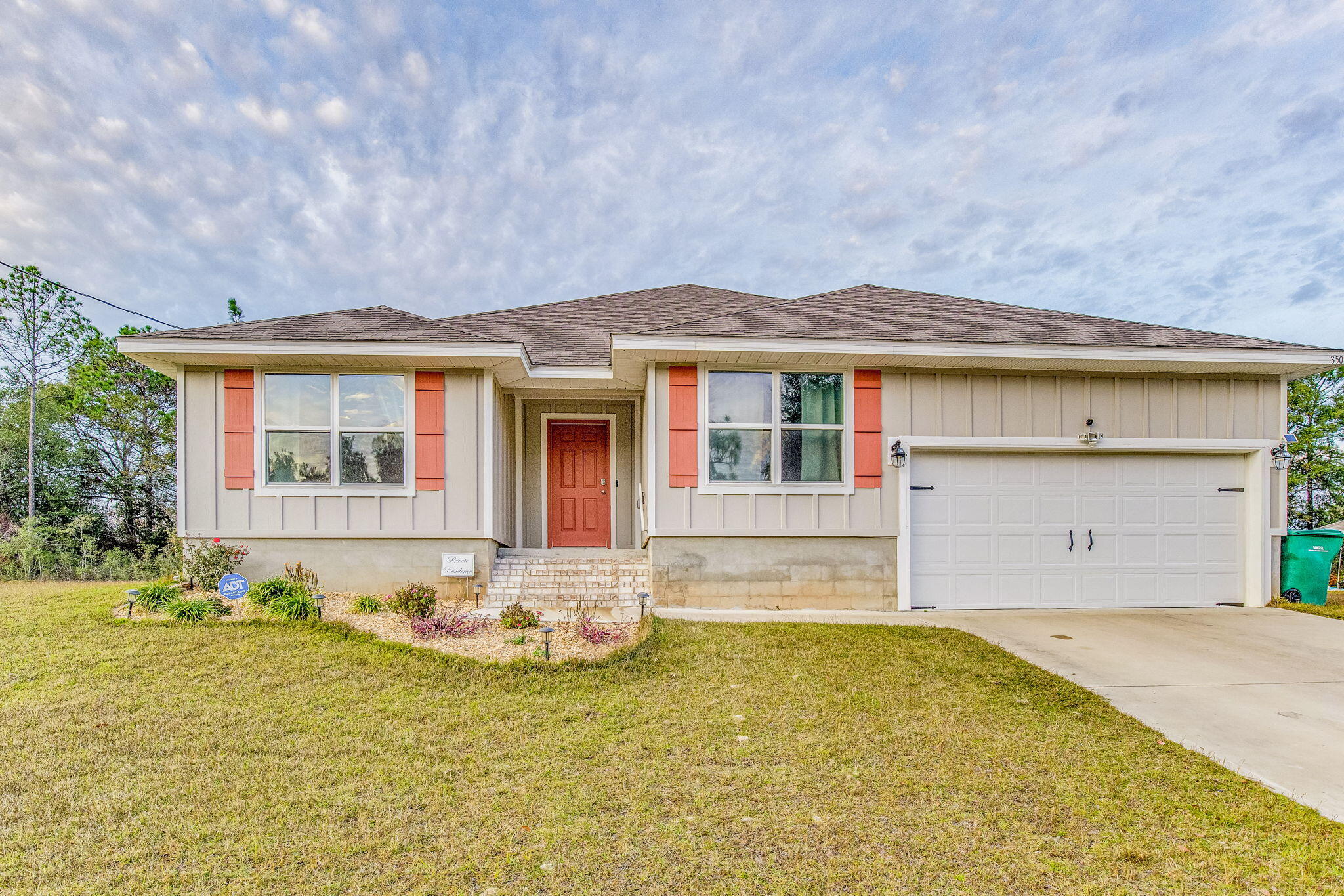 **OPEN HOUSE 12/30 11-1P** ASSUMABLE MORTGAGE AT 2.99%! Welcome to the thriving community of north Crestview, where convenience meets style. This stunning property is a testament to modern living and thoughtful design. Situated in a fast-growing locale, the community boasts well-maintained sidewalks and underground utilities. The Sawyer model itself is a masterpiece, offering a generous 5 bedrooms and 3 baths within its expansive floor plan. The open design seamlessly blends functionality and elegance, providing a fabulous space for both daily living and entertaining.Inside, the home exudes warmth and sophistication with wood-look flooring throughout, complemented by the comfort of carpet in the bedrooms.