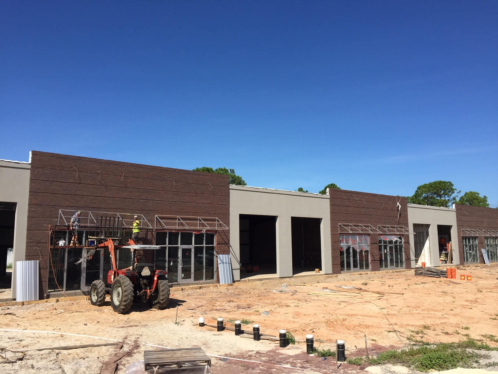 Emerald Coast Business Park will be the newest Office / Warehouse environment in the area. This site isstrategically located between Destin & Sandestin creating easy access to both markets and beyond. This facility will have glass storefronts and front loaded 14' roll up doors for easy access & loading. The exterior of the building will have a classic red brick & stucco facade and flat metal awnings over the front doors. This listing is for the 3 units remaining. Each unit 1980 SF and the developer has planned to buildout and air-condition 510 SF to include 1 enclosed office, 1 restroom & open showroom. The warehouse space will be 1470 SF. Target rent $12/SF base rent + $2.50/SF NNN + 6.8% sales tax. We currently have 3 vacancies each 1980 SF. These can be divided.