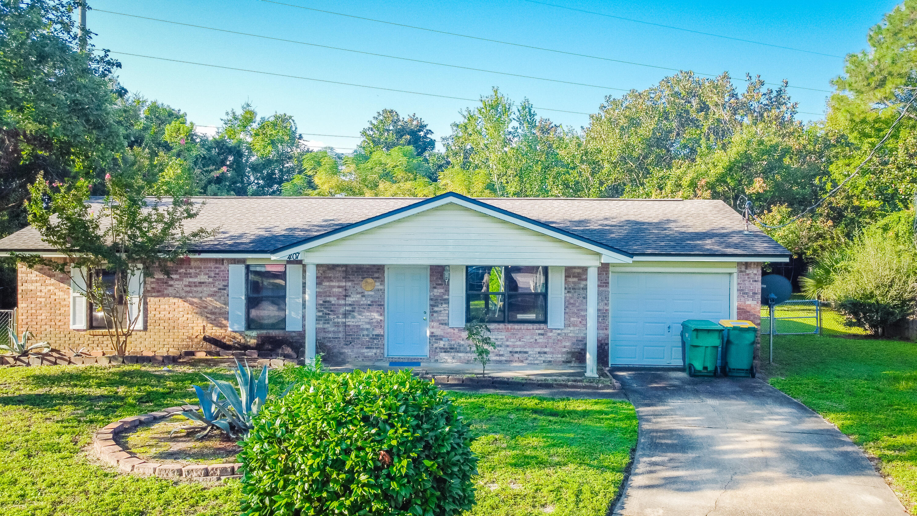 Wonderful home on the end of a cul-de-sac in Mary Esther! The property showcases a large, fenced backyard with several trees and a yard building, along with an open patio area that has two access points from inside the home.  The interior features two separate living areas, a U-shaped kitchen with wood cabinetry and granite countertops that opens to the dining room, and three bedrooms opposite of the living area.  The property is located within 4.6 miles of Hurlburt Field, within 8 miles of Navarre, and within 10 miles Downtown Fort Walton Beach.