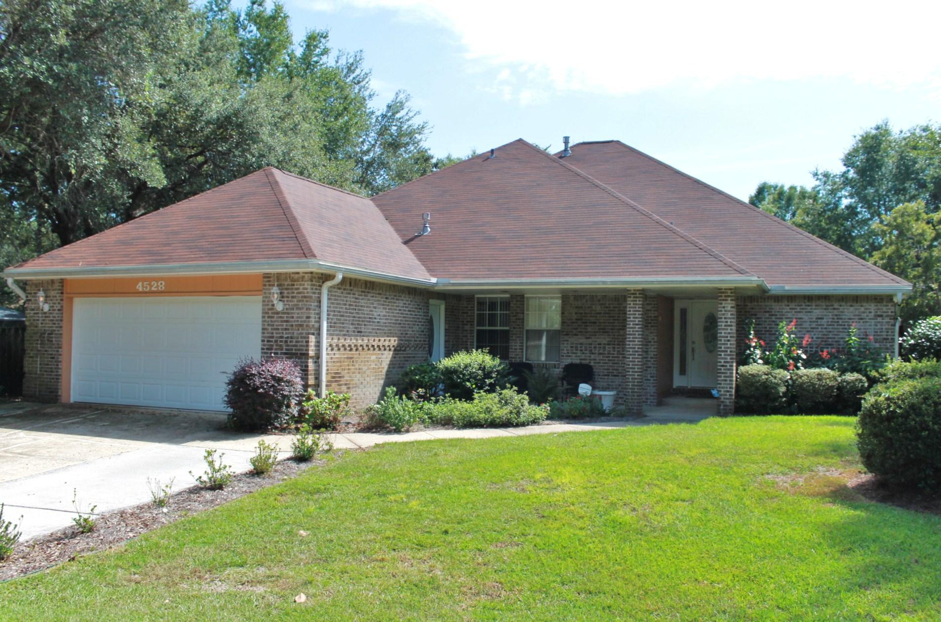MOVE IN READY!! Incredible 4 bedroom 3 Bath home located in the highly desired neighborhood of Parkwood Estates is ready for a new family. Very large master bedroom located on the 1st floor has a large walk-in closet, jetted tub, separate shower and dual vanities. There is an additional bedroom downstairs located next to a full bath. The home is complemented with a large living area with gas fireplace and family room with views of the pool. Large formal dining room that exits directly off of the upgraded kitchen. The kitchen has granite counter tops and tons of cabinet storage. The upstairs has two additional bedrooms with walk-in closets and another full bathroom. The large back yard has an enclosed heated pool with waterfall and plenty room for entertaining. This is a must see!!