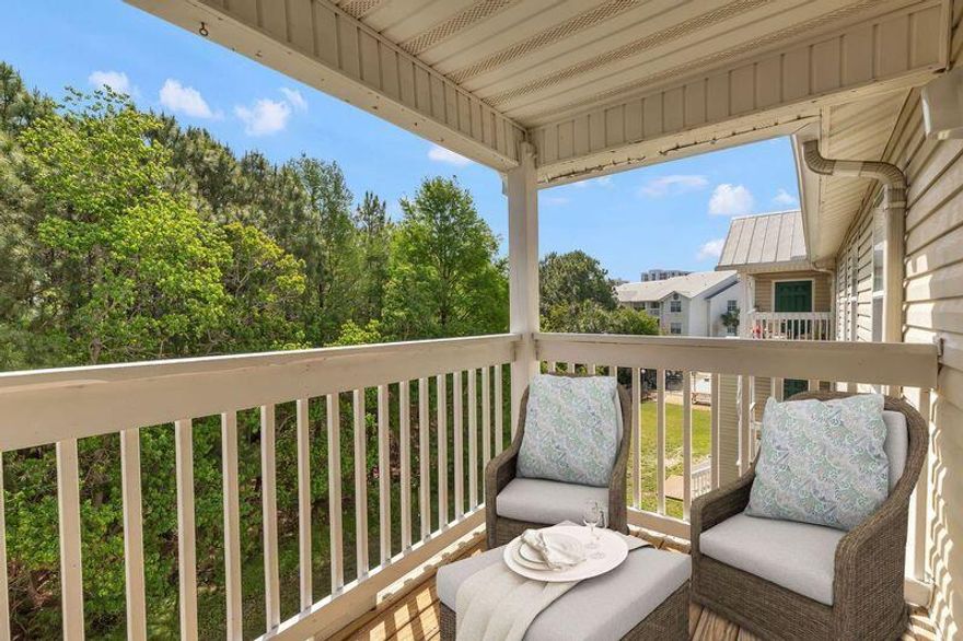 FROM YOUR BALCONY ALL YOU SEE IS TREES AND BIRDS.   WHAT A VIEW!!!!  THIS UNIT HAS HAD A MAKE-OVER.  NEW FLOORS, GRANITE TOPS IN BOTH THE KITCHEN AND BATHROOM. NEW KITCHEN APPLIANCES, CABINETS REPAINTED.  ALL NEW FIXTURES AND FANS. WASHER AND DRYER REPLACED IN 2024.  Located in the HEART of DESTIN.  Great for a full-time residency or a rental.  Close to Everything-Henderson Beach, Walmart and the Outlet malls.  Dog park across the street.  The open concept of the living, dining, and kitchen offers an inviting environment for both entertaining or a quite night with your family.  Go to the beach and come home to your pool and BBQ area.  In the morning-Hit the Gym.