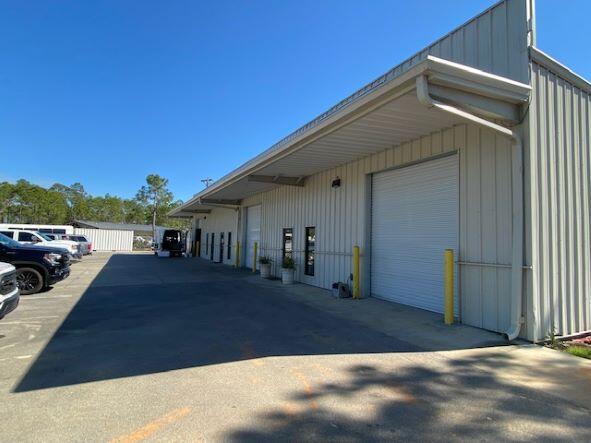 2303 Highway US 98, Santa Rosa Beach is zoned with hard-to-find light industrial.The building was built in 2016 and sits on .74 acres. It consists of 3 bays totaling 6050 sq. ft. The 3 bays (2000 sq. ft. each) are heated and cooled with Flex office/warehouse space. Bay A is currently utilized as a 2000 sq. ft. warehouse with 1 bathroom. Bay B consists of 1000 sq. ft. of finished space, including large kitchen, dining area, office space and bathroom with additional 1000 sq. ft. warehouse space. Bay C consists of lobby, 6 offices, kitchen, bathroom, and warehouse space. Flexible cap rates.