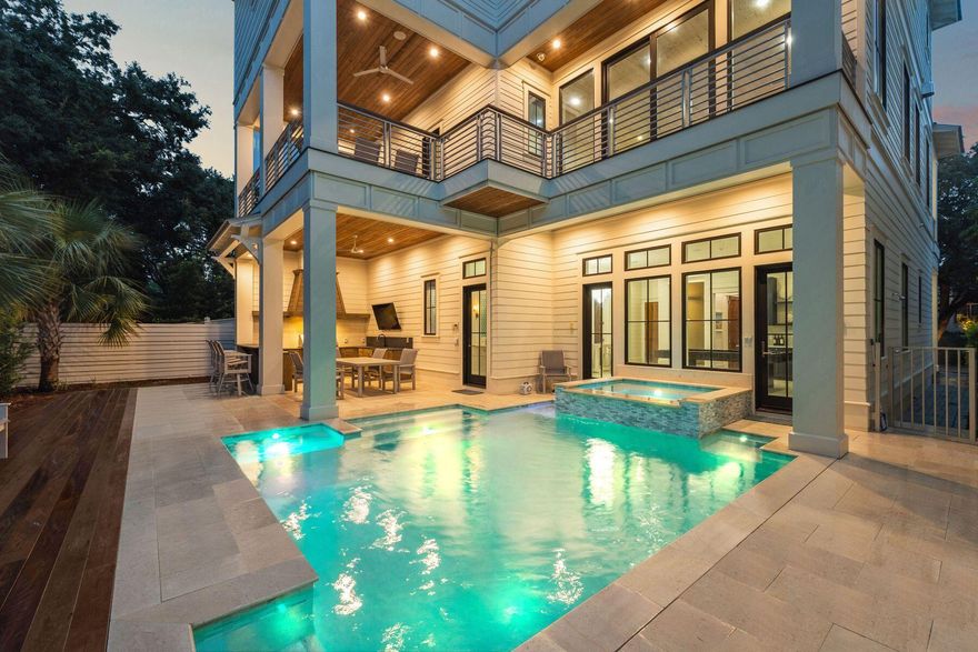 Welcome to 57 Azalea Street, a beautiful beach retreat located in Old Seagrove. This home offers luxury coastal living with two public beach accesses just 250 steps away. The home features 8 bedrooms and 8.5 bathrooms, plus a private resort-style pool, outdoor kitchen, dining area, bar space, rooftop deck with Gulf views, game room, and an elevator. The first level features a family entertainment area with a large game room. It also includes a guest bedroom with an ensuite bathroom and a bunk room with three Queen-over-Queen bunks and a shared shower. On the second level, the open living area combines elegance and comfort. The gourmet kitchen has high-end stainless steel appliances, a large marble-topped island, and custom cabinets. Step outside to the spacious terrace and take in the views of the resort-style pool and hot tub, which look beautiful at any time of day. In the primary suite, a king-sized bed welcomes you to relax. The ensuite bathroom feels like a spa, featuring a deep soaking tub, a large walk-in shower, and double vanities. There are also Twin-over-Twin bunk beds for extra guests. The third level focuses on guest comfort and privacy. It includes an additional primary suite with a private bathroom that has a shower and soaking tub, three guest suites with private bathrooms, and a two-twin bedroom with a private bathroom. End your day by enjoying a cocktail on your private rooftop deck as you watch the stunning sunset paint the sky with gold and pink colors. This luxury beach home represents elegance, comfort, and modern style. Experience the best of coastal living, where every detail is carefully designed.
