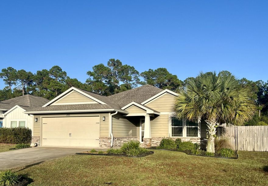 Beautiful 4 bedroom / 2 bathroom home in an appealing neighborhood. Lovely open floor plan with a large fenced backyard that backs up to a wooded area. The backyard is an oasis with the landscaping and beautiful palm trees. Also includes a shed. The four bedrooms are spacious, and have new carpet. The large open kitchen features an oversized granite breakfast bar. The 10' ceilings have crown molding. This is a 'must see' home! Lease terms: 1 yr. To view, come by the Navarre Beach Realty office at 8666 Navarre Parkway in the Winn Dixie Shopping Center to check out the keys. Office hours are Monday - Friday 9am - 5pm. Keys must be returned to the office by 5pm. They cannot be kept out overnight.