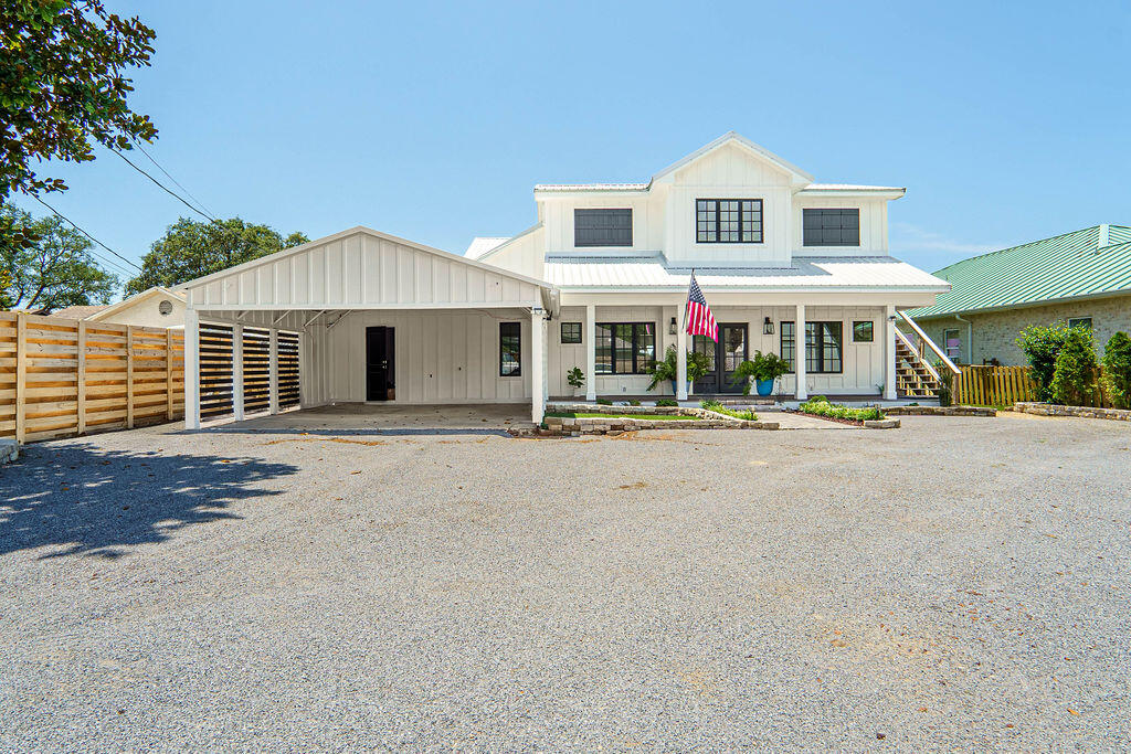 Waterfront Luxury Meets Custom Craftsmanship - 2035 Wind Trace Rd, Navarre FLWelcome to your private soundfront retreat on the beautiful shores of Navarre! This extraordinary, newly rebuilt coastal home offers 3,500 square feet of custom living space, featuring 4 bedrooms in the main residence plus a fully equipped upstairs guest apartment with separate interior and exterior access--perfect for multi-generational living, guests, or income-producing potential. Perched on nearly half an acre with 75+ feet of waterfront and no HOA, the property features an approximately 300-foot dock with two boat lifts--one of which is covered. Relax in your saltwater pool or entertain in the spacious gazebo while enjoying panoramic views of Santa Rosa Sound. This home has been completely taken down to the studs and thoughtfully reimagined with luxury and efficiency in mind. Highlights include all-new HVAC (including dual Samsung 18 SEER heat pumps and mini-splits), new electrical with 300-amp service, new PEX plumbing, new high-grade cabinets, appliances, LVP flooring, drywall, doors, trim, and sound-insulated walls. The R-2 zoning allows for even greater flexibility, including short-term rental or multi-unit options. This home features 4 individual lockouts. With the final touches left for the buyer to personalize, this is a rare opportunity to own a waterfront masterpiece designed for comfort, style, and coastal living.